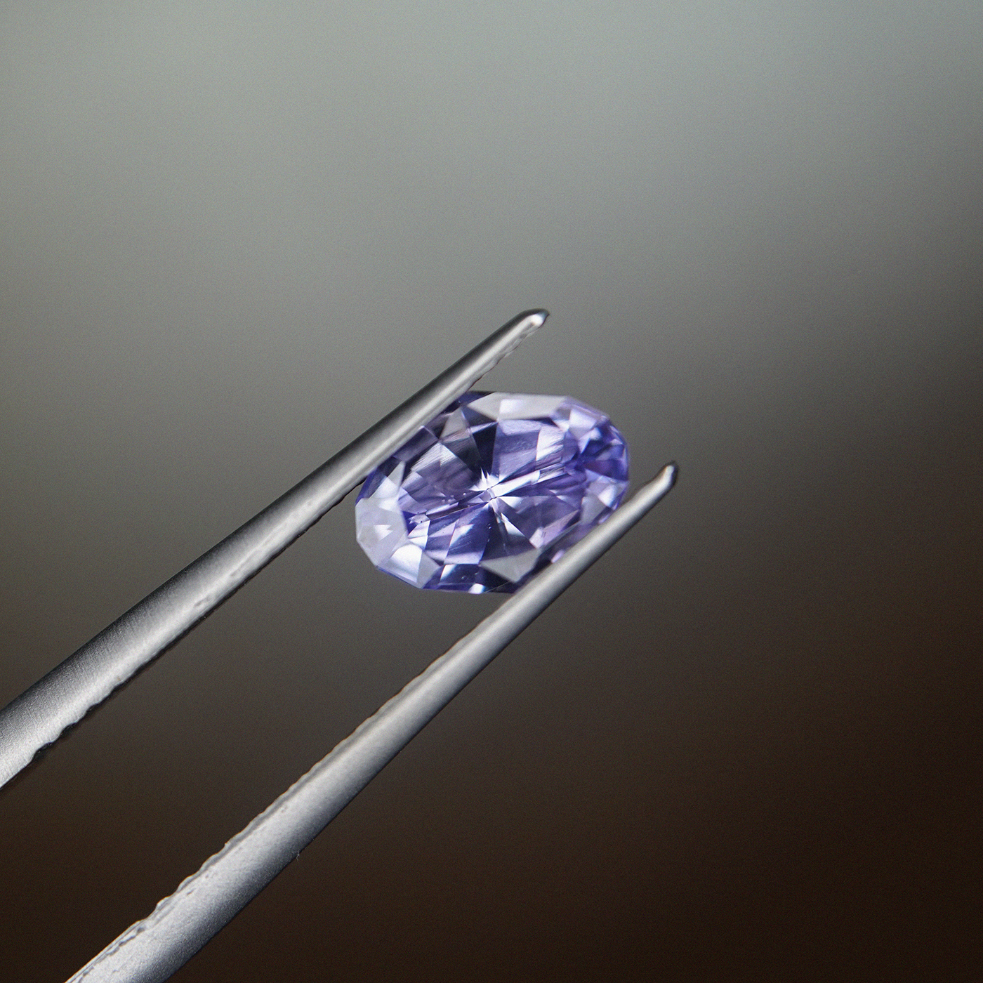 color change blue sapphire 0.9ct modified oval cut